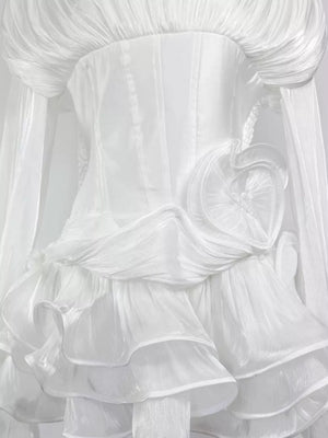 White ruffled mini dress with corset waist and heart detail