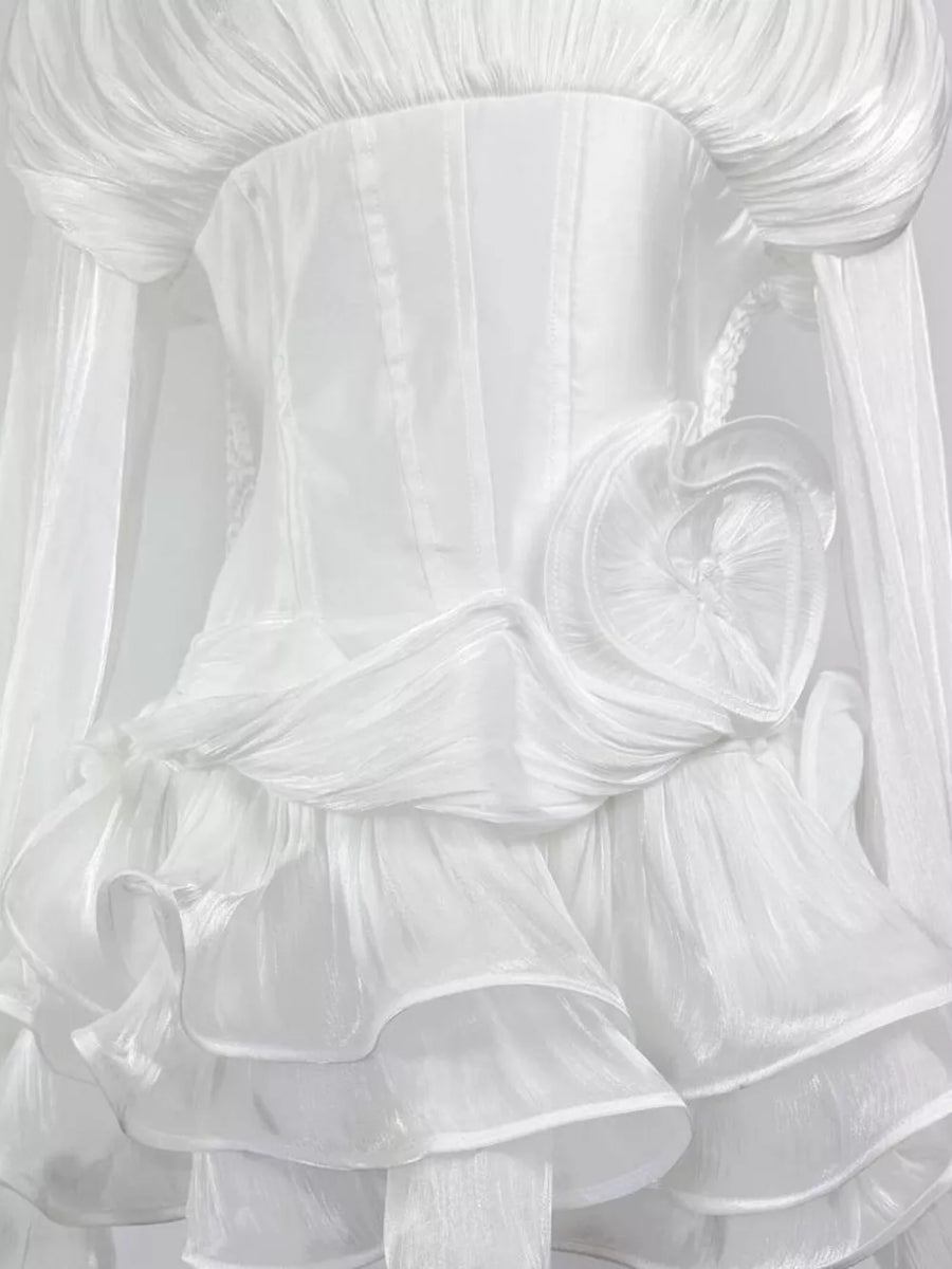 White ruffled mini dress with corset waist and heart detail