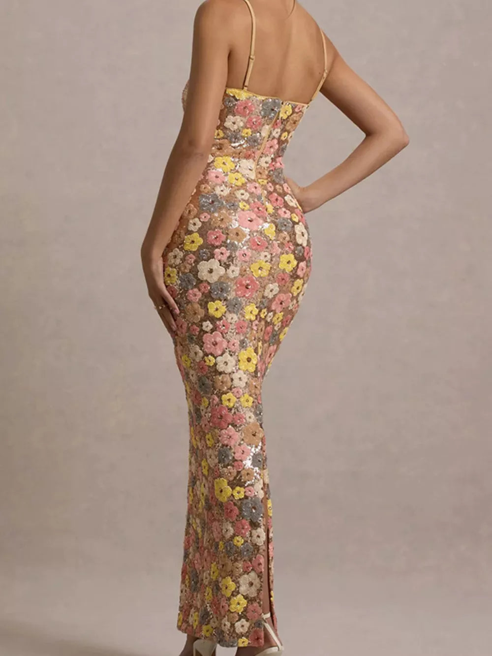 Floral sequin maxi dress with spaghetti straps and a bodycon fit.