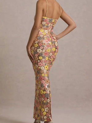 Floral sequin maxi dress with spaghetti straps and a bodycon fit.