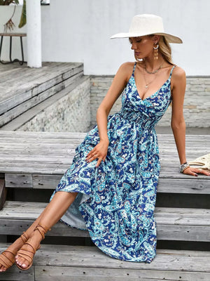 Blue paisley print midi dress with spaghetti straps and smocked waist