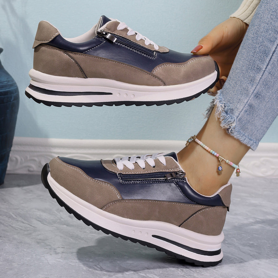 Zipper detail lace up sneakers in navy and tan with a chunky sole.