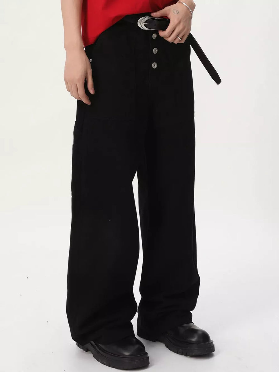 Black relaxed wide-leg cargo pants with button fly and silver buckle belt.