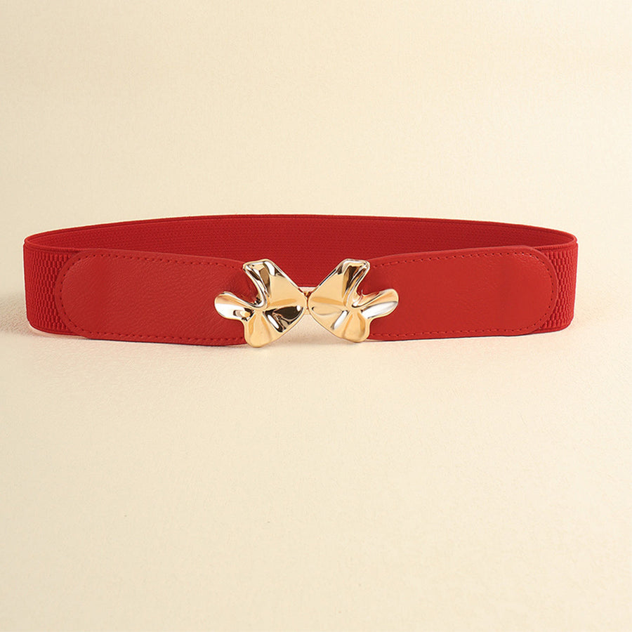 Red elasticated waist belt with gold bow clasp detail