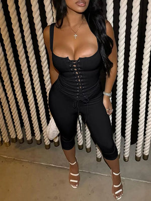 Black ribbed lace-up tank top and capri pants set with a scoop neckline.