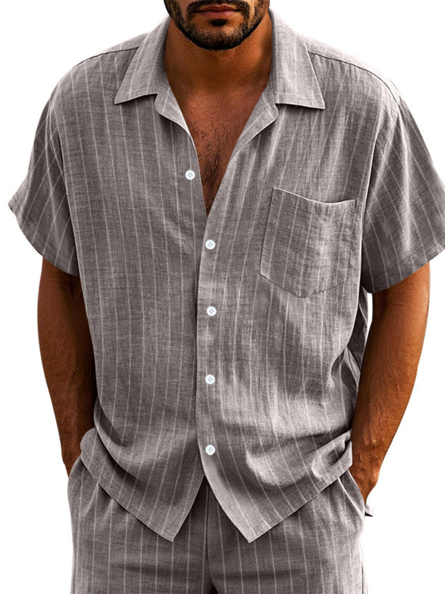 Men's grey striped cotton camp collar short sleeve shirt with button-down front and chest pocket.