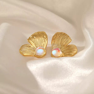 18K Gold-Plated, Resin, Stainless Steel Care instructions: Avoid wearing during earrings in gold with statement silhouette