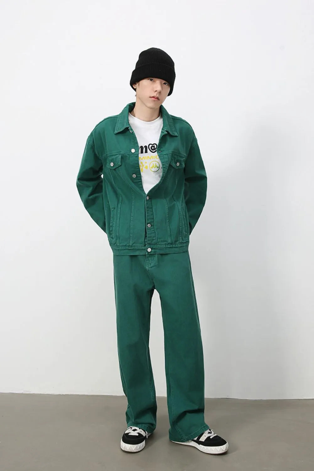 Dark green rigid denim wide-leg trousers with a casual fit.
