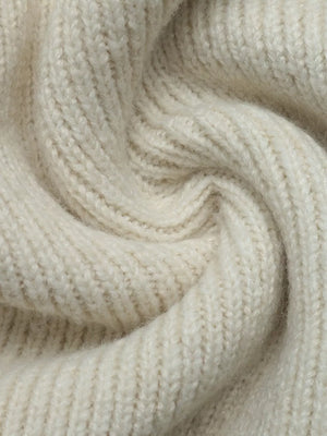 cream cardigan with open-front and four-leaf clover motif