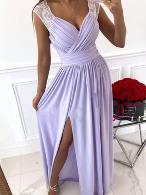 Lavender maxi dress with lace cap sleeves, V-neck, ruched bodice, and high slit.