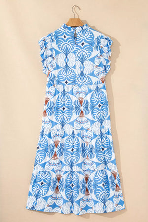Blue and white botanical print tiered midi dress with ruffled flutter sleeves and mock neck.