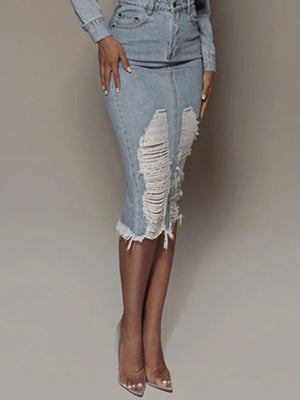 Light wash denim pencil skirt with distressed rips and frayed hem