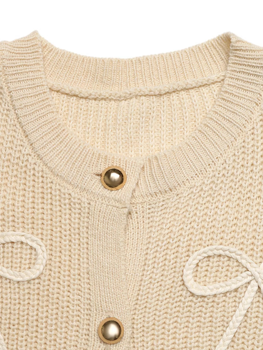 Ribbed knit cardigan in khaki with button-up front and braided bow details.