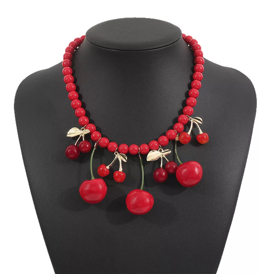 Red necklace with clasp and cherry motif