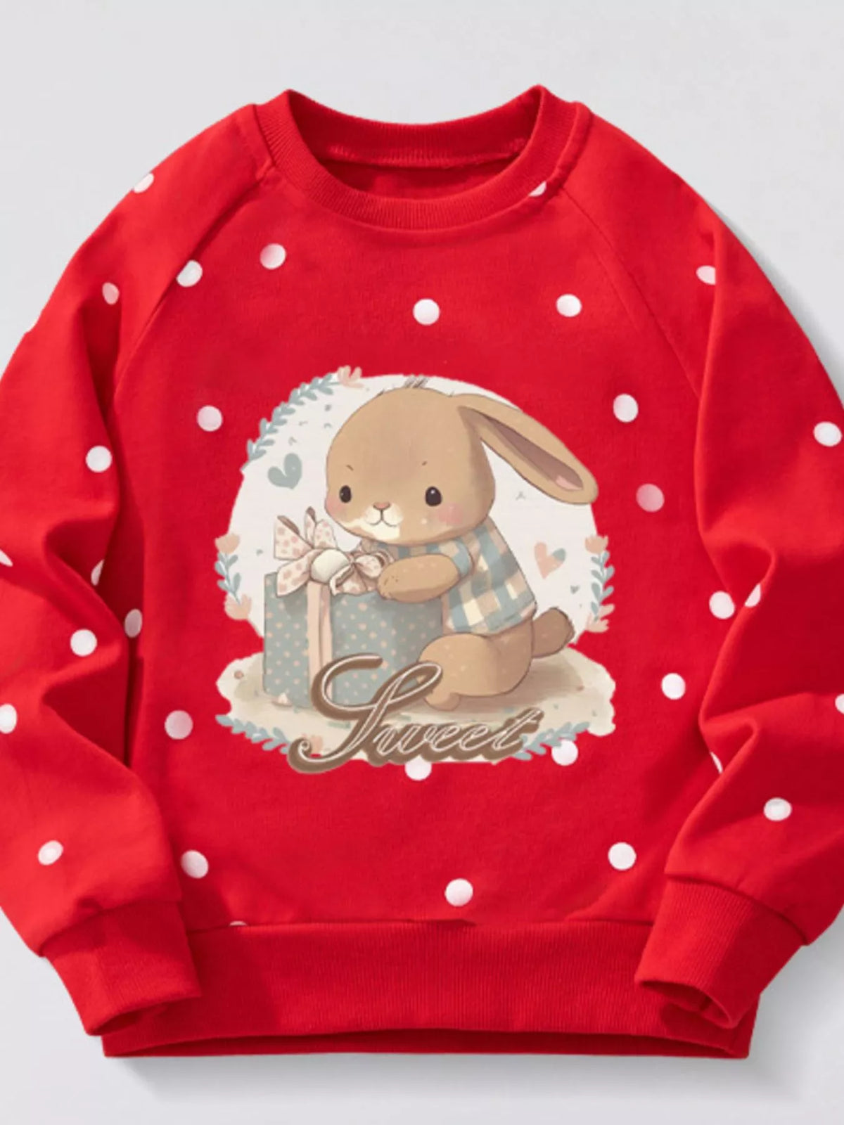 Red polka dot cotton sweatshirt with a cute bunny and gift graphic.