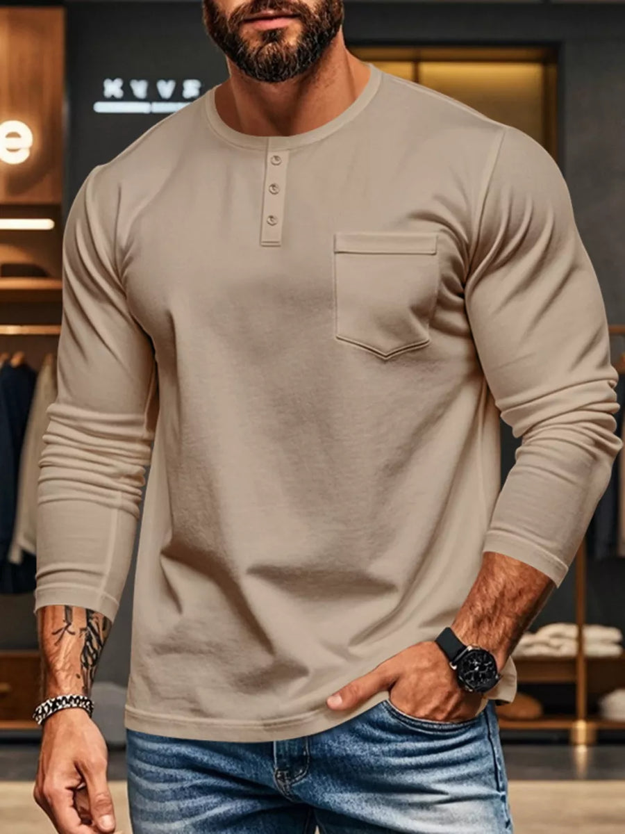 Khaki long sleeve henley t-shirt with button placket and chest pocket.