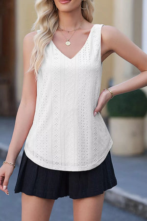 White eyelet knit V neck tank top with a textured pattern.