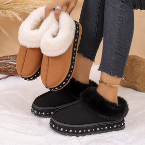ankle boots in black featuring faux fur lining and boot fit