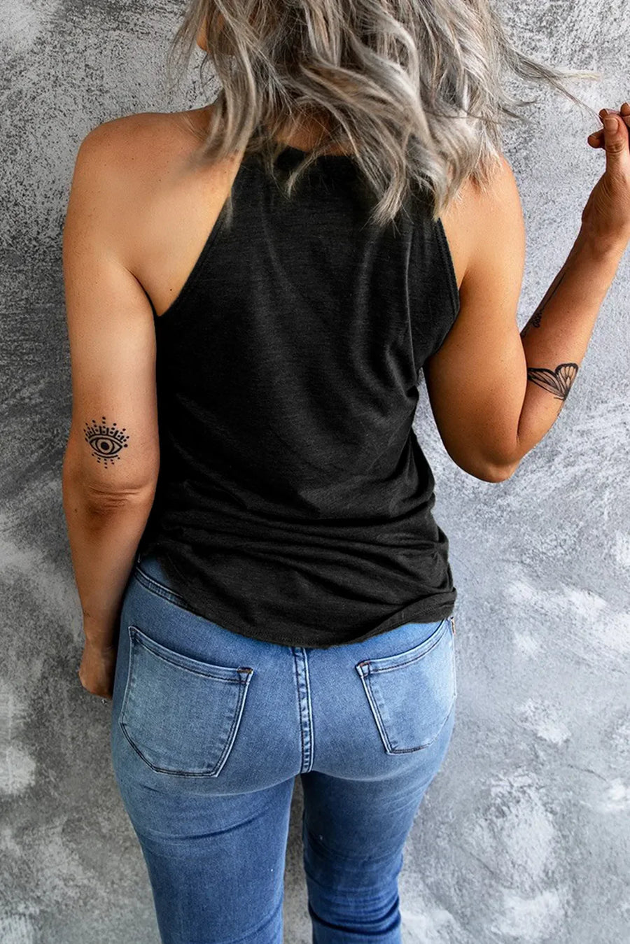 Black halter tank top with patriotic graphic detail and a relaxed fit.