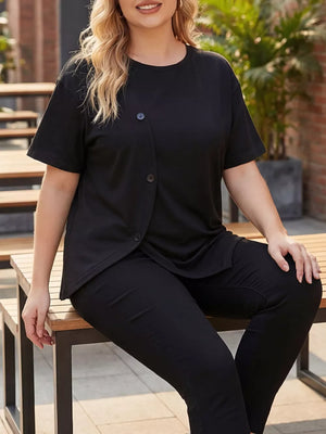 Black asymmetrical plus-size maternity t-shirt with button accent detail.