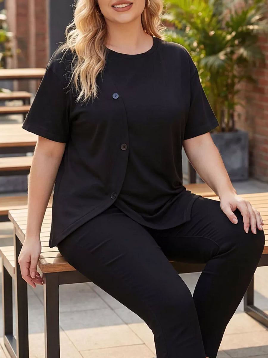Black asymmetrical plus-size maternity t-shirt with button accent detail.