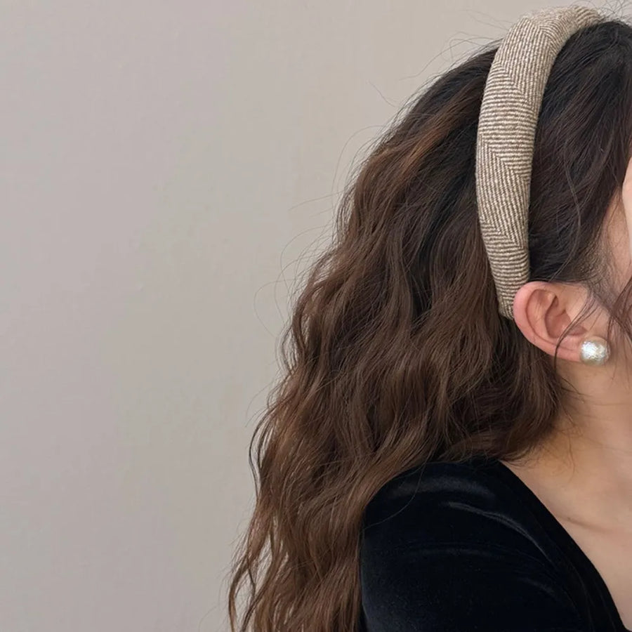 Textured tweed padded headband in Khaki with herringbone pattern.