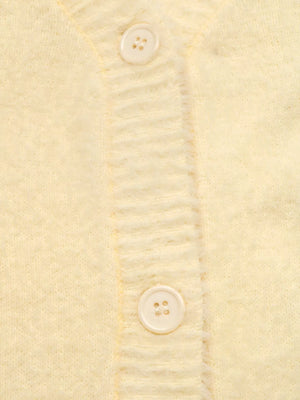 pale yellow cardigan with pocketed and long sleeve