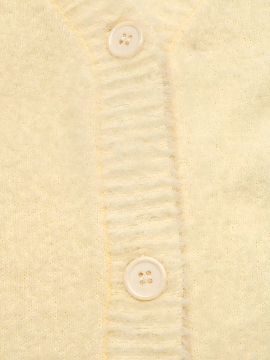 pale yellow cardigan with pocketed and long sleeve
