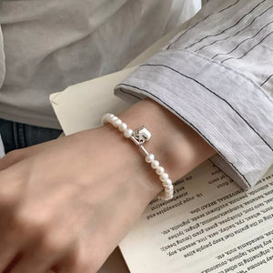 cream bracelet with not applicable and toggle