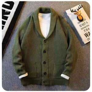 Army green buttoned cardigan with shawl collar and pockets, ribbed knit.