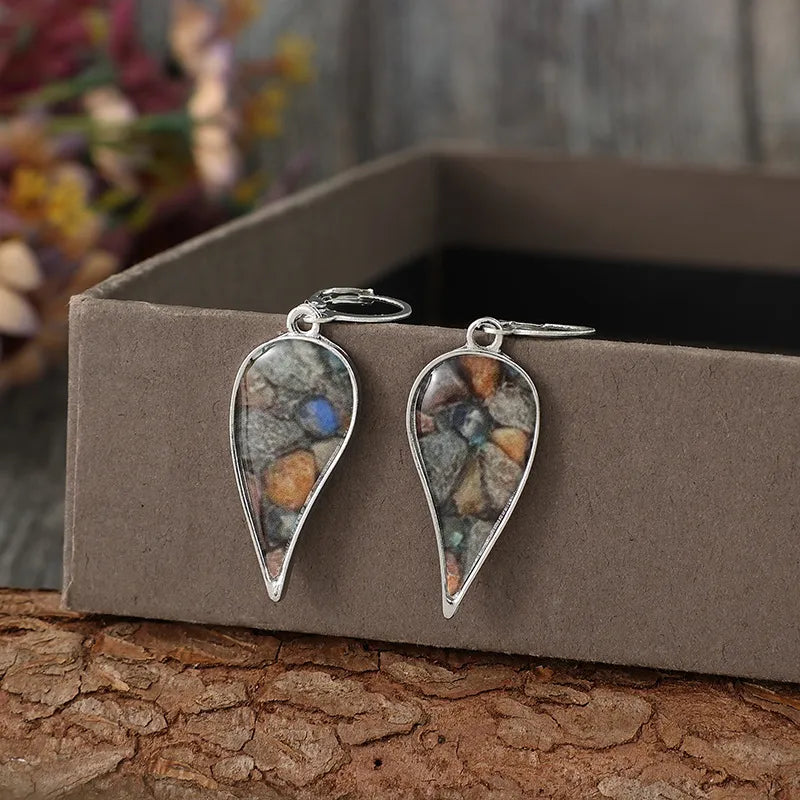Pebble mosaic teardrop earrings in silver with colorful stone inlay.