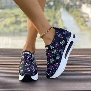 Butterfly print slip-on flats with air cushion and chunky sole.