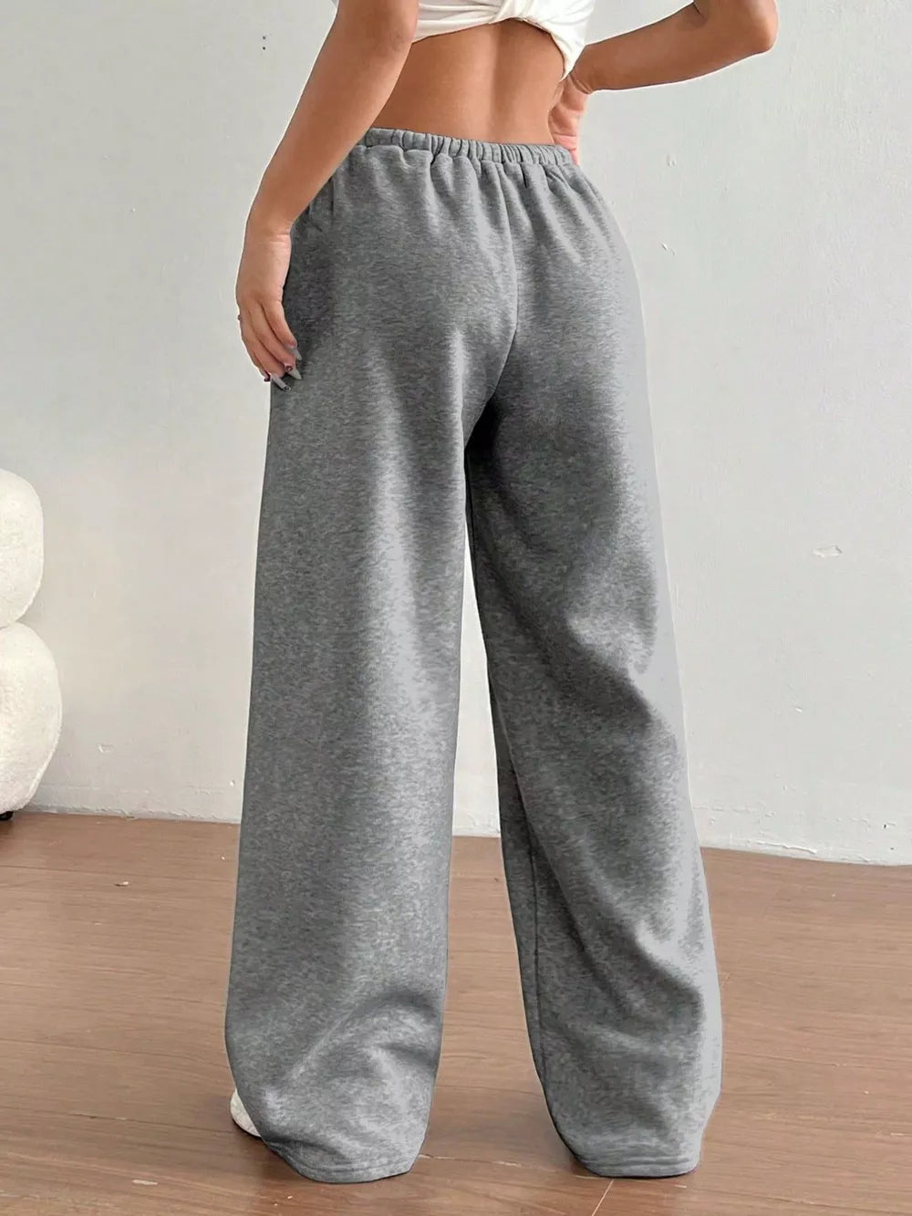 Gray wide-leg maternity joggers with an elastic waistband.