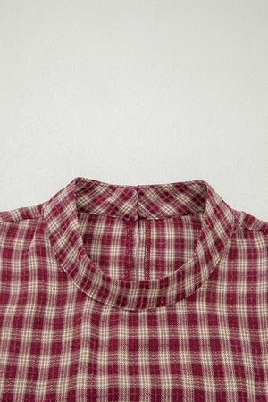Country plaid long sleeve blouse in burgundy with button keyhole detail.