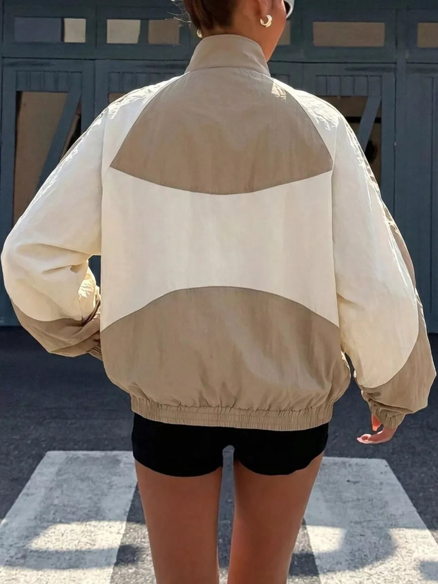 Black windbreaker with zipper and long sleeve