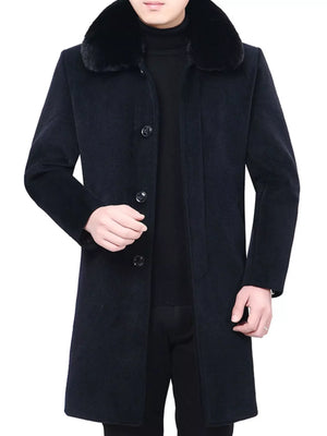 Men's black buttoned overcoat with fur collar and tailored fit.