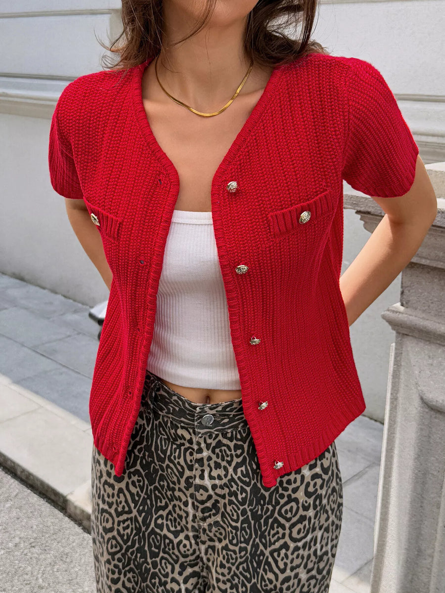 Red buttoned short-sleeve knit cardigan with decorative pockets and gold buttons.