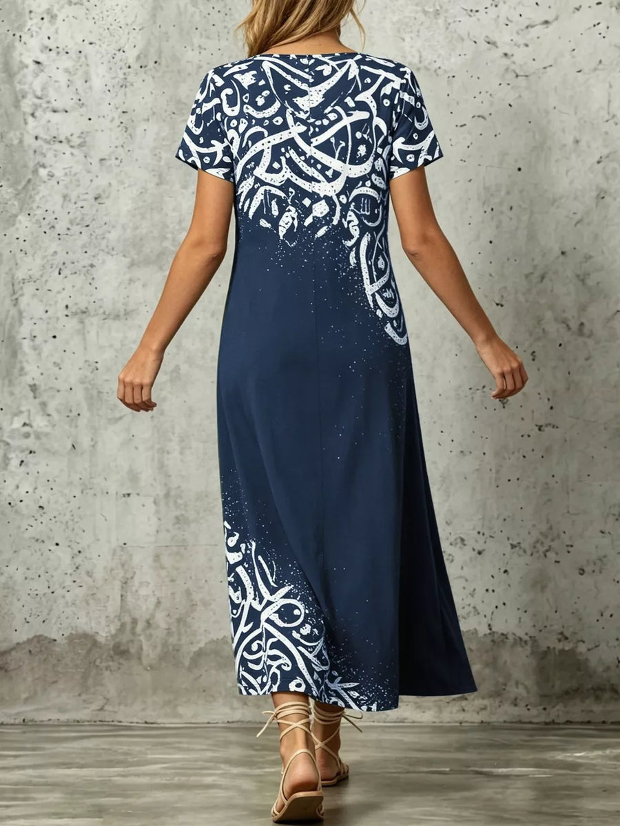 100% polyester Care instructions: Machine wash cold midi dress in Blue with A-line silhouette