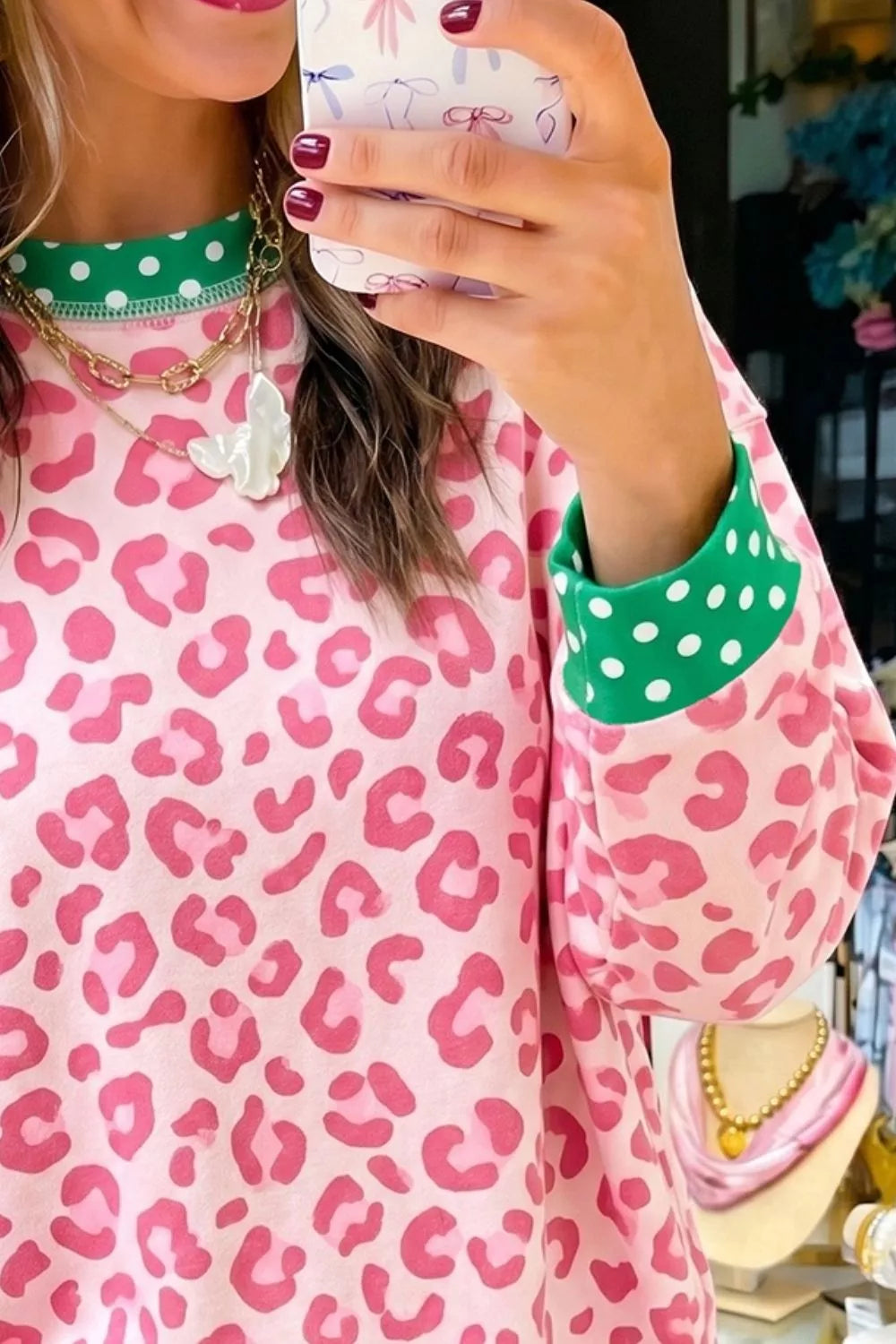 hot pink sweatshirt featuring stretchy and leopard-print