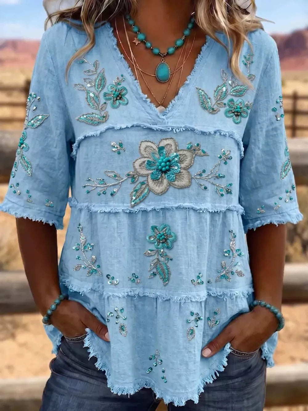 sky blue blouse with floral and v-neck
