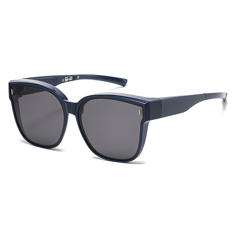 Dark navy oversized sunglasses with dark grey lenses and a sleek frame.