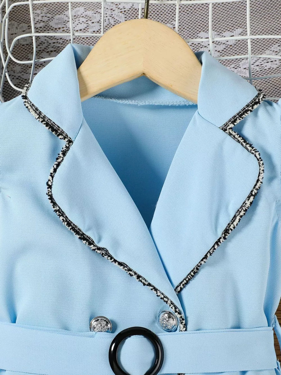 Sky blue toddler dress with double-breasted detail, black trim, and belted waist.