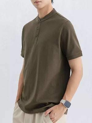 Men's dark green cotton t-shirt with mandarin collar and button placket.