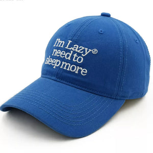 Royal blue cotton baseball cap with embroidered "I'm Lazy need to sleep more" slogan