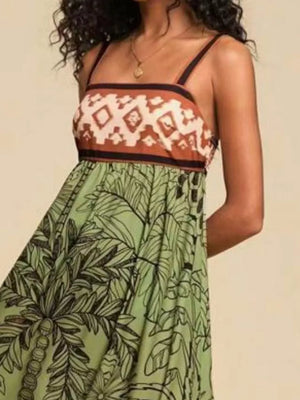 Maternity swim dress with square neck, tropical palm print and geometric bodice detail.