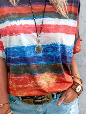Casual t-shirt with brushstroke stripes in red, white, blue, and orange.