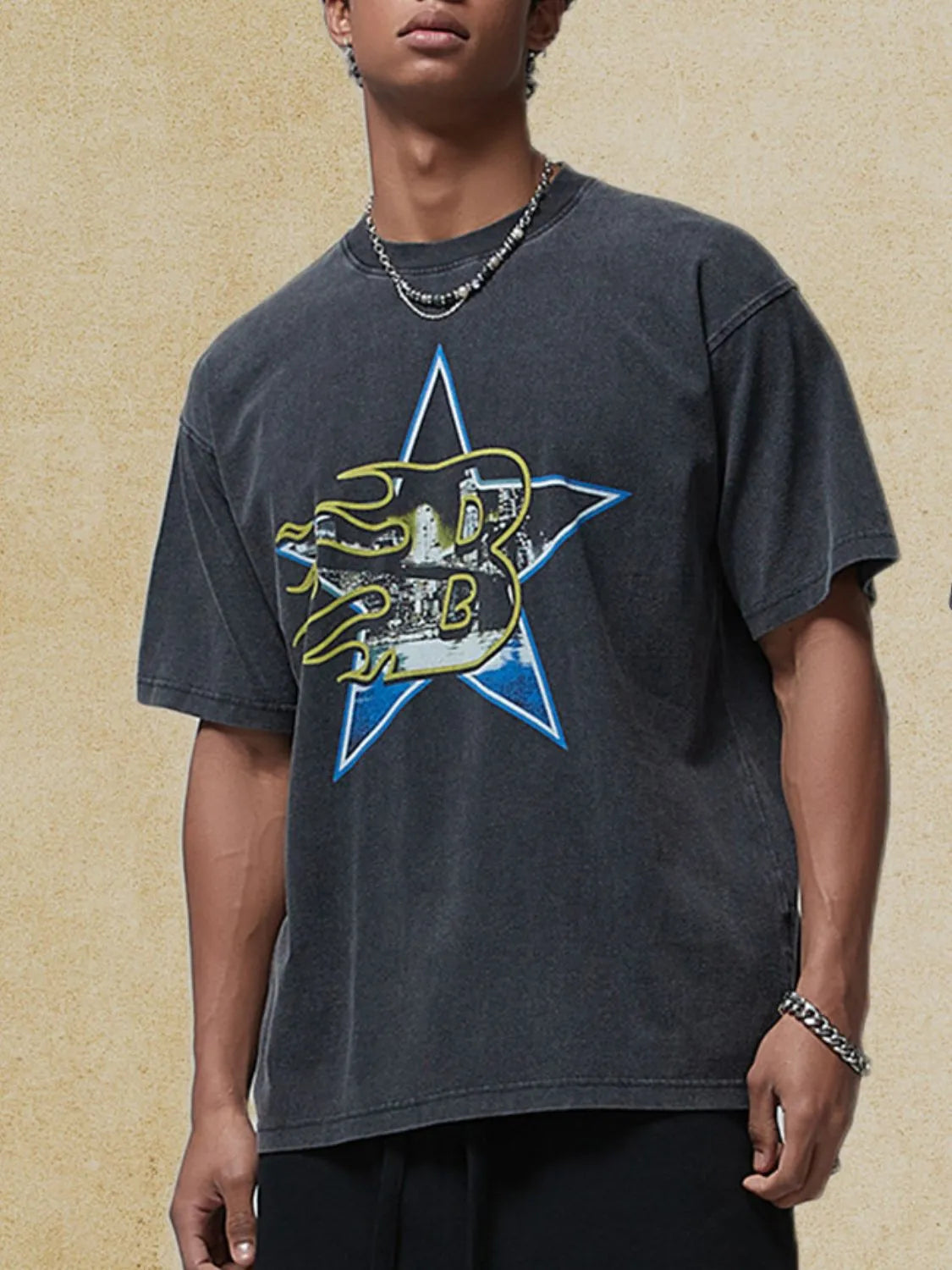 Black vintage graphic t-shirt with star and flame design