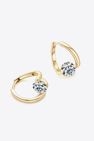 Gold orbital hoop earrings with a single round-cut diamond accent