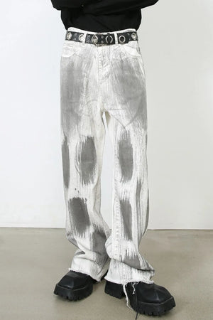 Brushstroke denim wide leg jeans in light with raw hem and artful grey abstract print.