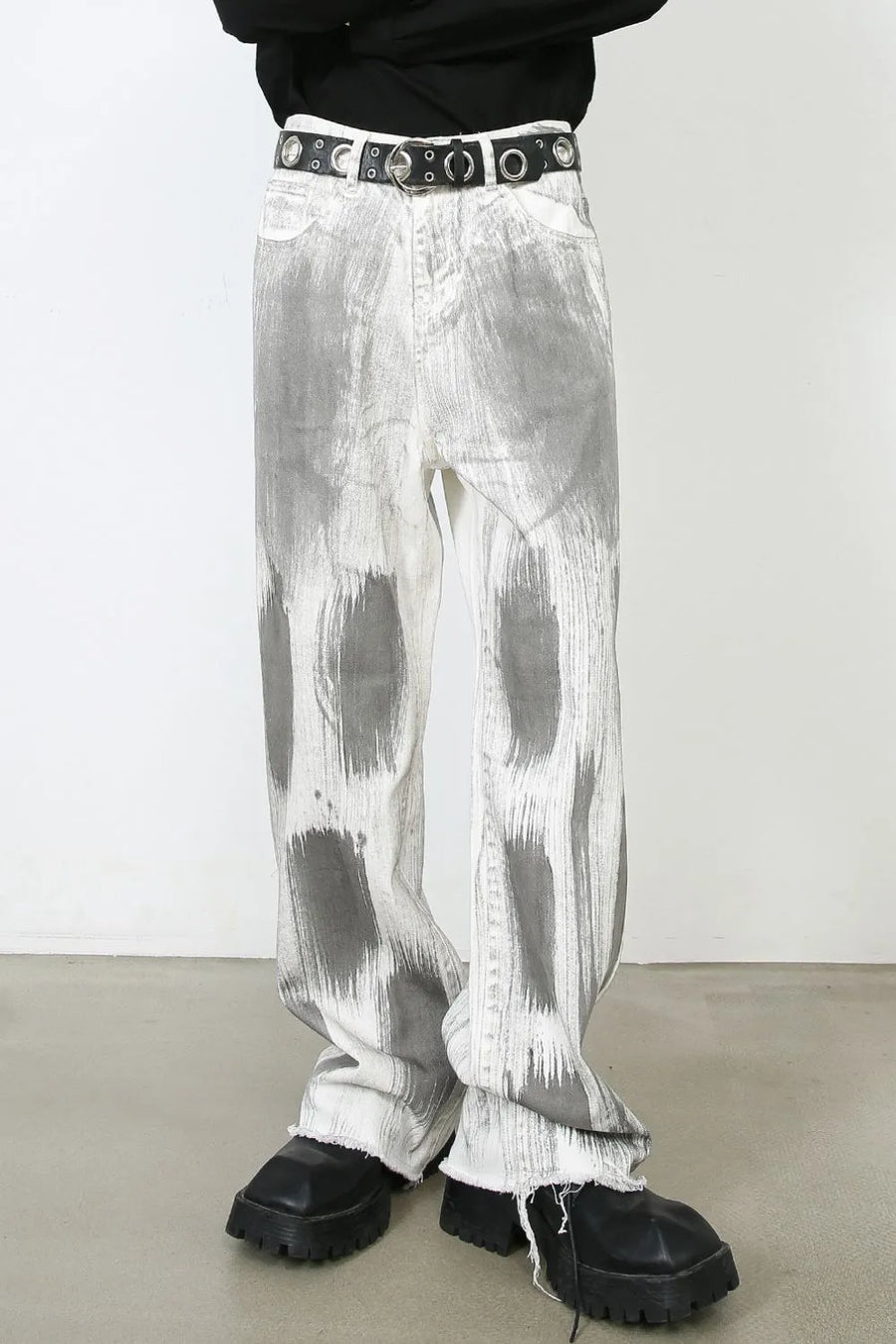 Brushstroke denim wide leg jeans in light with raw hem and artful grey abstract print.